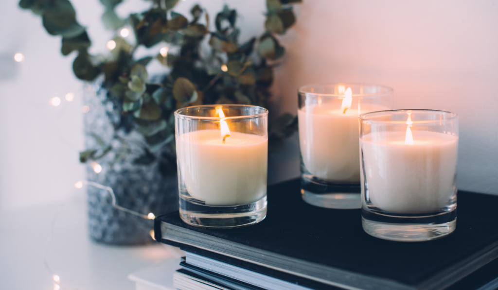 home decor 3 candles on stack of books