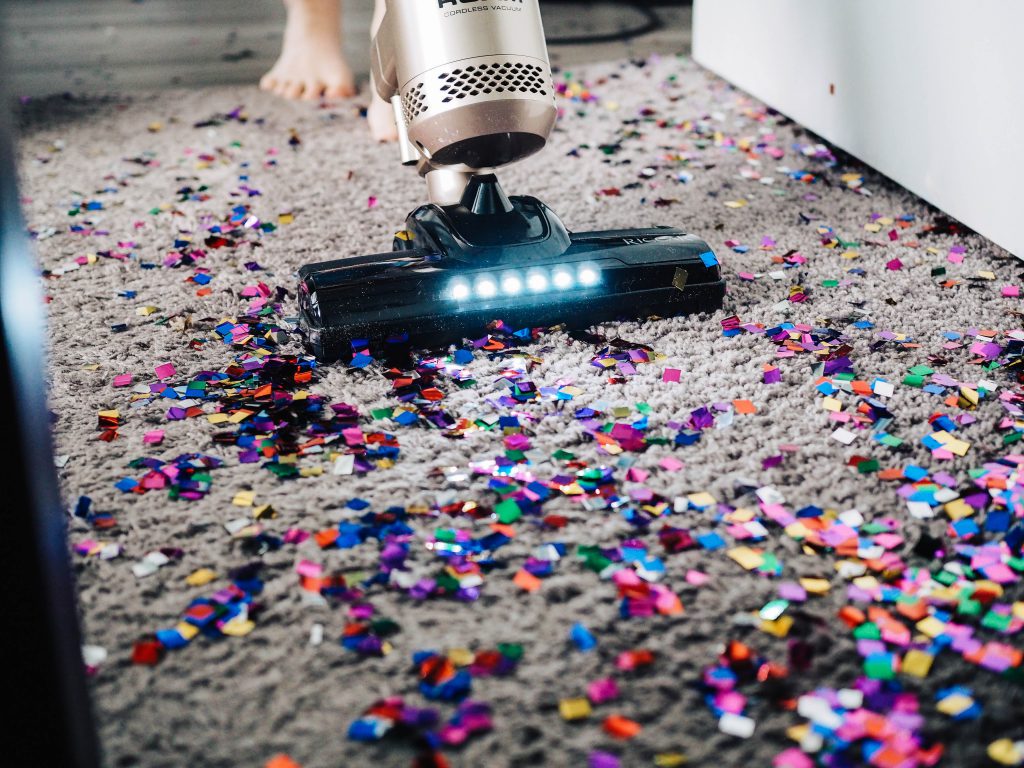 vacuuming confetti out of carpet