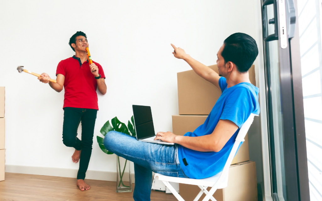 two-men-moving-in-inspecting-apartment