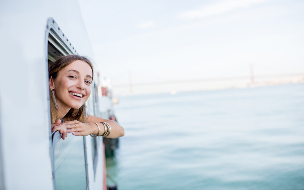 smiling woman riding water taxi