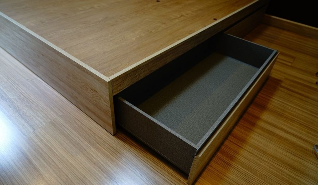 drawer under the bed to maximize space