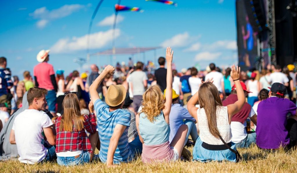 group of friends enjoying the music festival