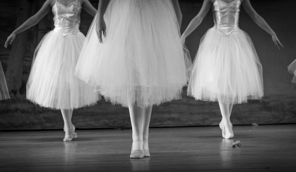 ballerinas on stage at a performing arts center