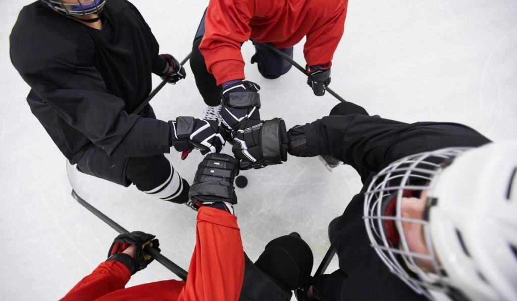 hockey team huddling