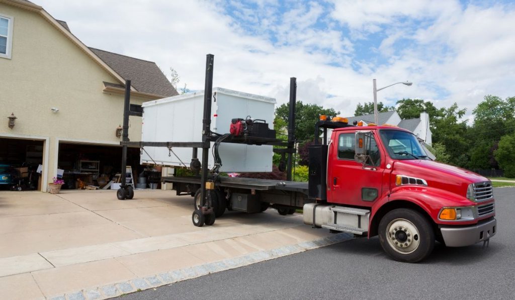 Portable Storage Unit being delivered to a residential building