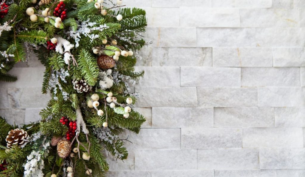 wreath hanging on a white wall