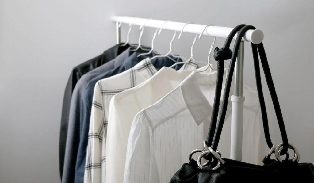 different clothes hanging on a clothes rack