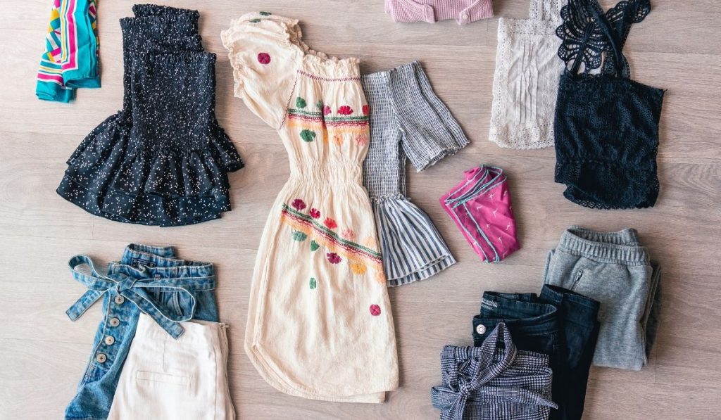 flat lay of different clothes (capsule wardrobe)