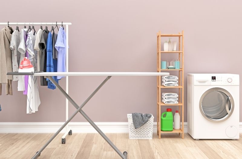 laundry room with drying rack