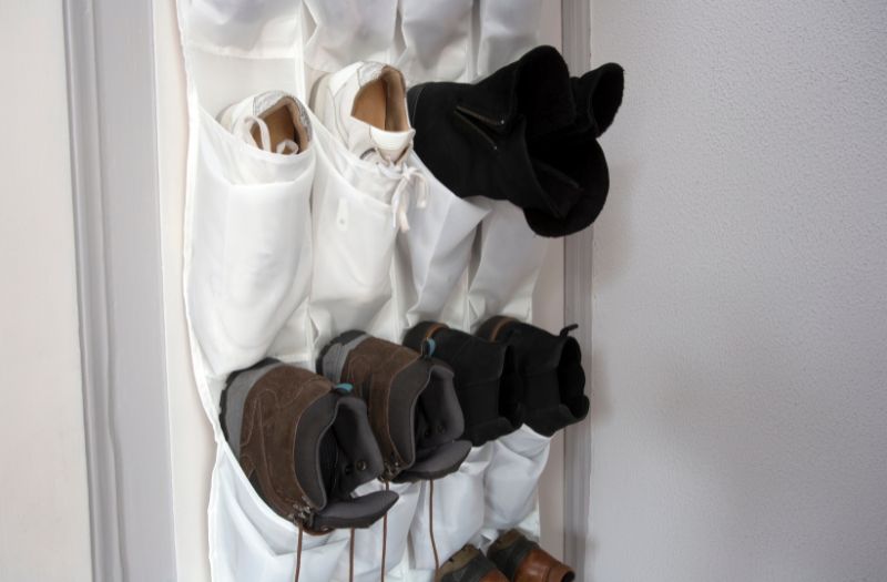 shoe storage hanging at the back of the door