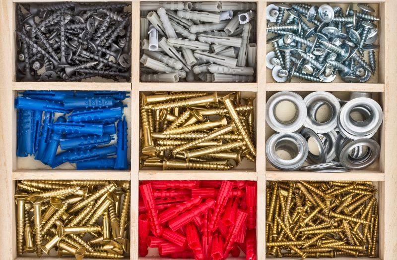 container organized per screws, nail and bolts