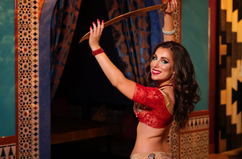belly dancer performing at a restaurant