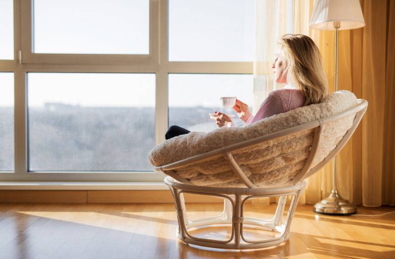 woman drinking coffee peacefully at home