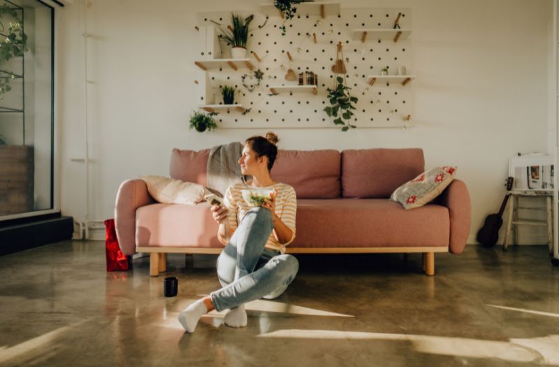 woman enjoying her meal at home alone