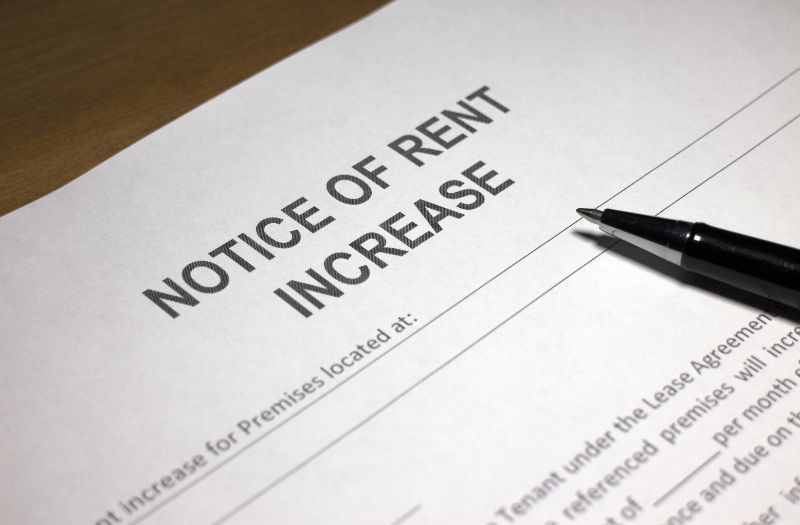 notice of rent increase paper on the table